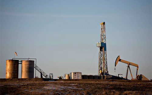 Một mỏ dầu ở North Dakota, Mỹ - Ảnh: Bloomberg.<br>