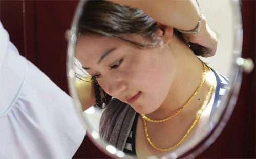 Tại thị trường Trung Quốc đại lục, nhu cầu nữ trang trong quý 3 giảm 39% so với cùng kỳ năm 2013, còn 147 tấn.