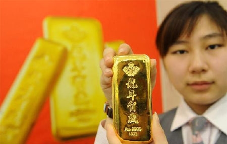 Năm 2013, Trung Quốc đã nhập 1.158 tấn vàng qua Hồng Kông, tăng hơn gấp đôi so với năm 2012 - Ảnh: News.cn.<br>