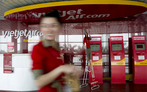 VietJet hiện có 20 chiếc máy bay Airbus A320 và dự kiến sẽ được giao 
hàng 9 máy bay tương tự theo đơn đặt mua 63 máy bay hồi tháng 2 năm 
ngoái - Ảnh: Bloomberg. 