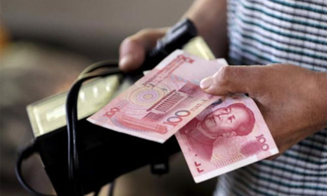 Tuần trước, đồng Nhân dân tệ giảm giá mạnh nhất trong lịch sử và xuống mức thấp nhất trong 4 năm - Ảnh: Reuters.<br>