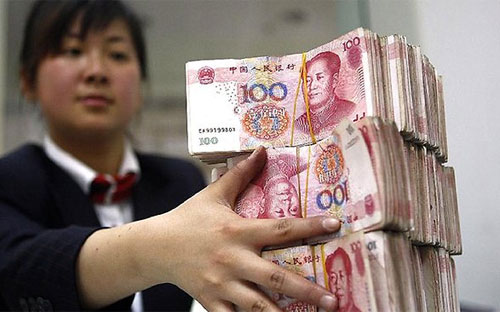 Đợt phá đồng tiền quy mô lớn đầu tiên của Trung Quốc kể từ năm 1994 đã khiến thị trường tài chính toàn cầu bị sốc - Ảnh: Bloomberg.<br>