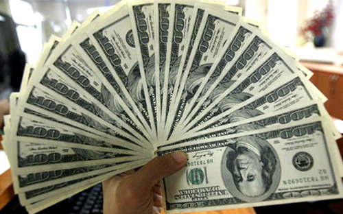 Trong lần tăng tỷ giá chính thức này, Ngân hàng Nhà nước điều chỉnh tỷ 
giá bình quân liên ngân hàng từ mức 21.458 VND/USD lên 21.673 VND/USD, 
tương đương mức điều chỉnh tăng 1% - Ảnh: Reuters.