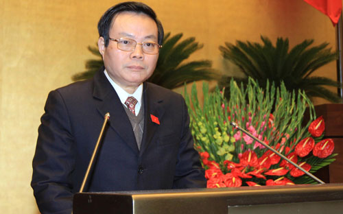 Chủ nhiệm Ủy ban Tài chinh - Ngân sách trình bày báo cáo thẩm tra quyết toán ngân sách nhà nước năm 2013.