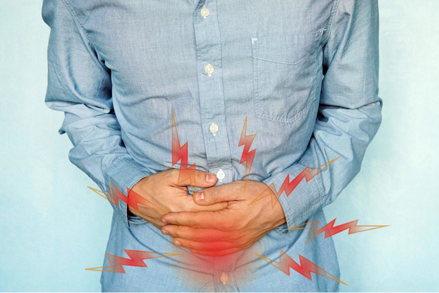 Rối loạn tiêu hóa sau khi uống rượu bia, cảnh báo nguy cơ viêm đại tràng - Ảnh 1.