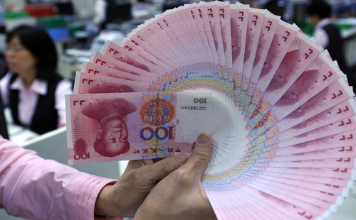 Một tính toán của ngân hàng Standard Charter cho thấy hơn 60 ngân hàng trung ương và quỹ trên thế giới đã đầu tư vào tài sản được định giá bằng đồng Nhân dân tệ, với tổng giá trị tài sản nắm giữ đạt 120 tỷ USD - Ảnh: Business Korea.<br>