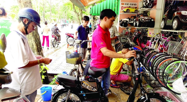Cân nhắc khi mua xe đạp điện cho con - Ảnh 1.
