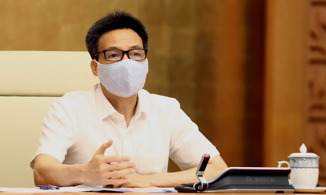 Phó Thủ tướng Vũ Đức Đam chủ trì cuộc họp Ban Chỉ đạo quốc gia phòng, chống dịch Covid-19 chiều 21/5. Ảnh - VGP/Đình Nam. 