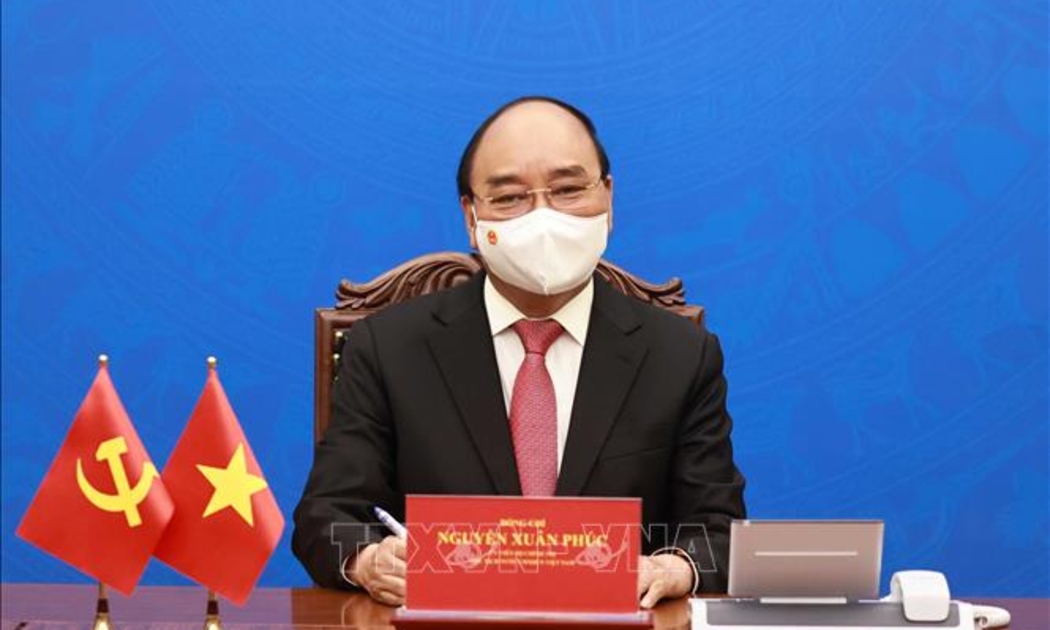 Chủ tịch nước Nguyễn Xuân Phúc tại cuộc điện đàm với Tổng Bí thư, Chủ tịch Trung Quốc Tập Cận Bình chiều 24/5 - Ảnh: TTXVN.