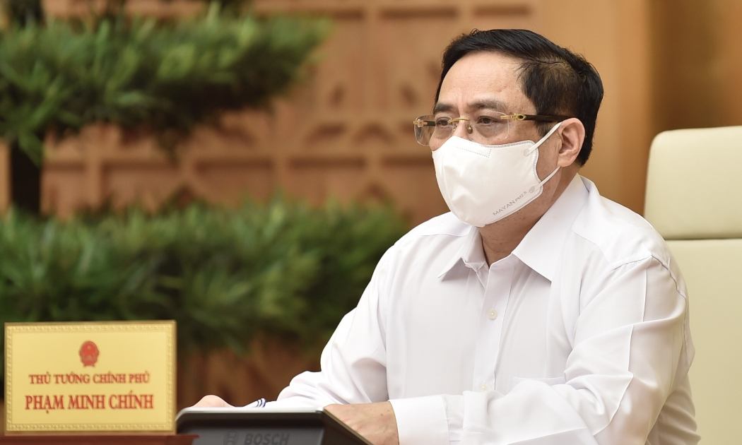Thủ tướng Phạm Minh Chính tại cuộc họp khẩn với tỉnh Bắc Ninh và Bắc Giang - Ảnh: VGP