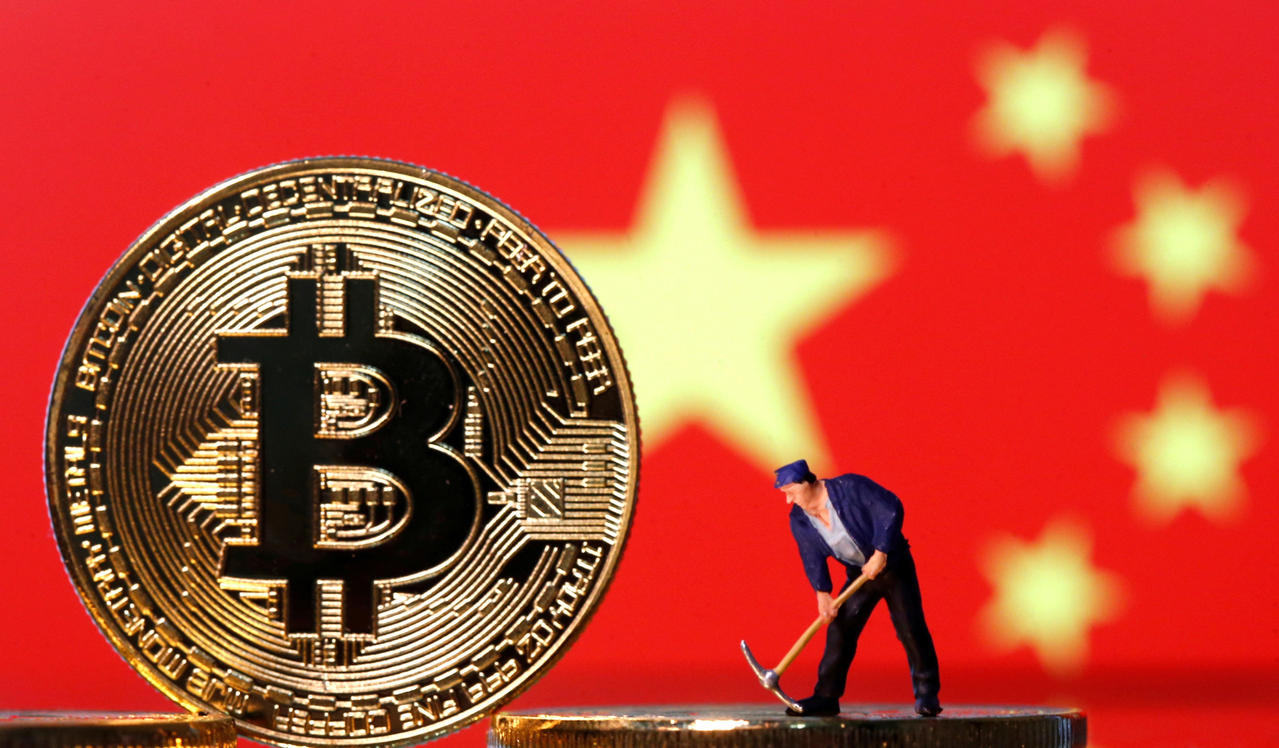 Ngày càng nhiều người trẻ Trung Quốc ôm mộng đổi đời với tiền ảo - Ảnh: Reuters.