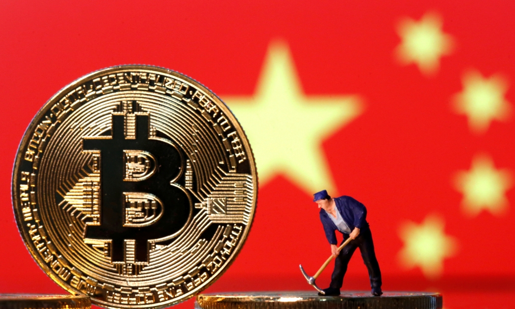 Ngày càng nhiều người trẻ Trung Quốc ôm mộng đổi đời với tiền ảo - Ảnh: Reuters.