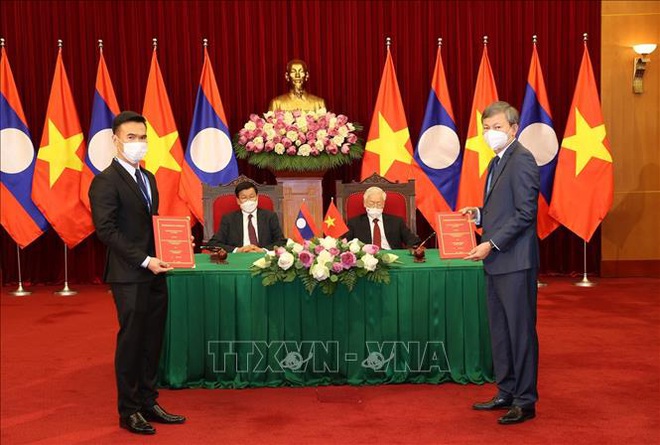 Lễ trao đổi hợp đồng mua bán điện nhà máy thủy điện Nậm Nơn 1 giữa Tập đoàn Điện lực Việt Nam và Tập đoàn Không-xắp Phát triển Nậm Nơn 1 và Nậm Nơn 3 - Ảnh: Trí Dũng/TTXVN
