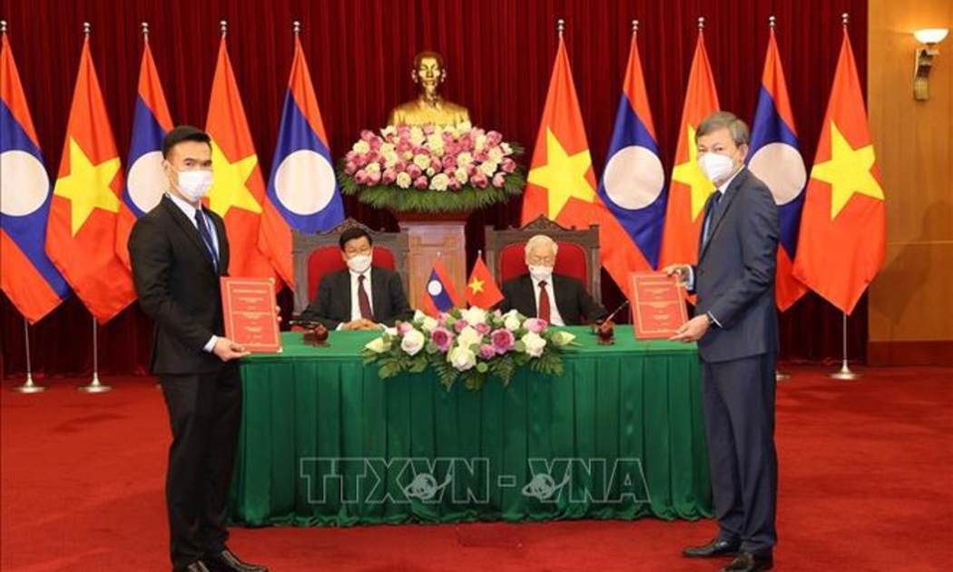 Lễ trao đổi hợp đồng mua bán điện nhà máy thủy điện Nậm Nơn 1 giữa Tập đoàn Điện lực Việt Nam và Tập đoàn Không-xắp Phát triển Nậm Nơn 1 và Nậm Nơn 3 - Ảnh: Trí Dũng/TTXVN