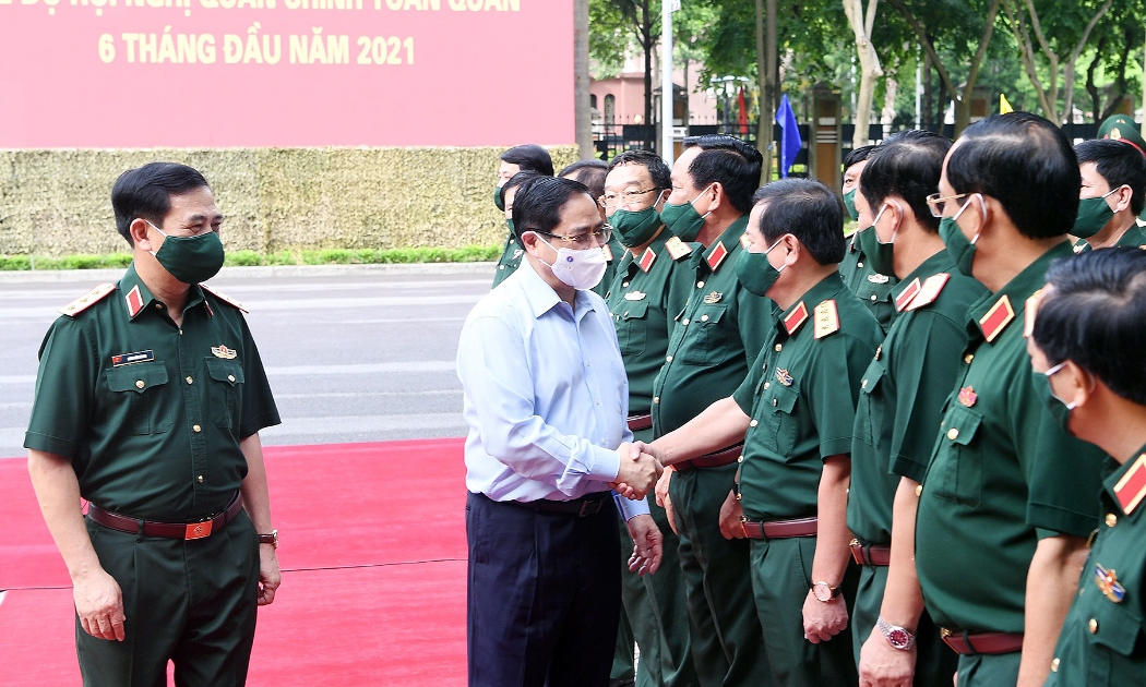 Lãnh đạo Bộ Quốc phòng đón Thủ tướng Chính phủ Phạm Minh Chính tới dự hội nghị - Ảnh: VGP.