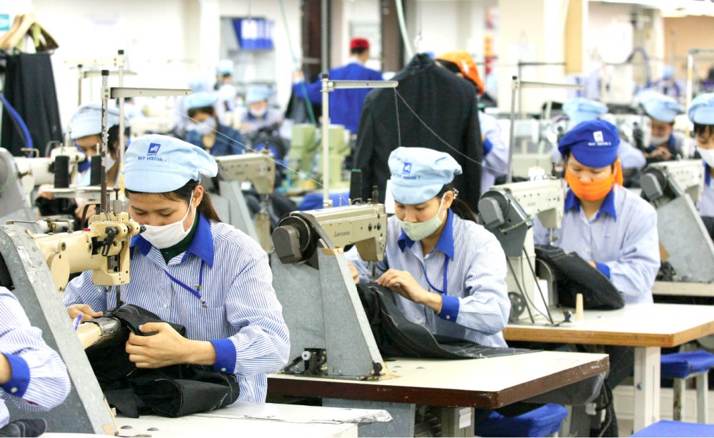 Lao động của các doanh nghiệp trong chuỗi cung ứng bị giảm sâu để thực hiện phòng dịch. Ảnh minh họa. 
