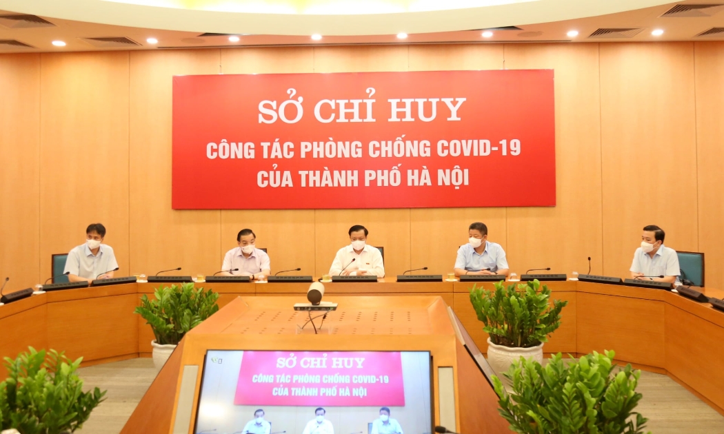 Toàn cảnh cuộc họp trực tuyến với sở chỉ huy các sở, ngành, quận, huyện, thị xã ngày 25/7.