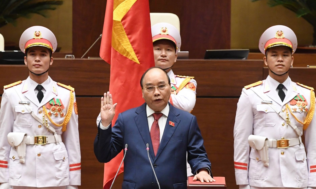 Chủ tịch nước Nguyễn Xuân Phúc tuyên thệ nhậm chức ngày 26/7 - Ảnh: TTXVN