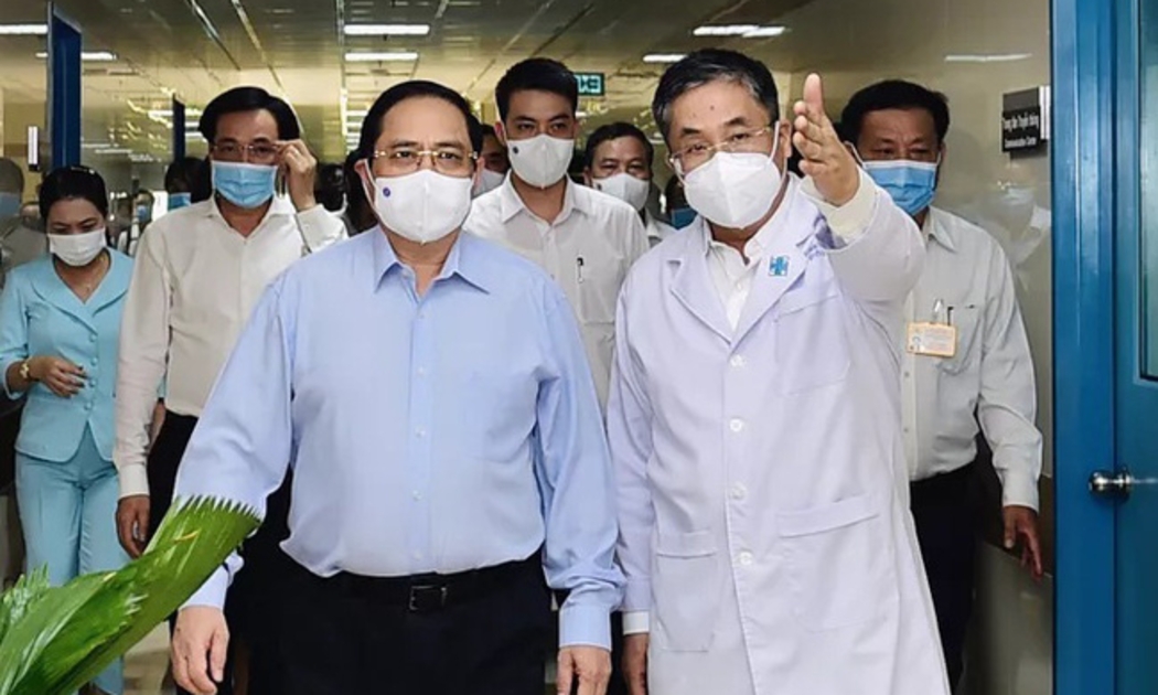 Thủ tướng Phạm Minh Chính kiểm tra công tác chống dịch ở TP.HCM hồi tháng 5/2021 - Ảnh: VGP