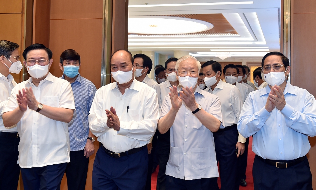 Từ trái sang phải: Chủ tịch Quốc hội Vương Đình Huệ, Chủ tịch nước Nguyễn Xuân Phúc, Tổng Bí thư Nguyễn Phú Trọng, Thủ tướng Chính phủ Phạm Minh Chính, tới dự Phiên họp - Ảnh: VGP/Nhật Bắc