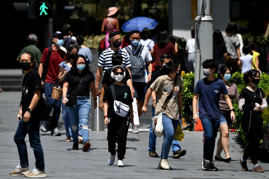 Singapore đang từng bước triển khai kế hoạch "sống chung với Covid" - Ảnh: Straits Times.