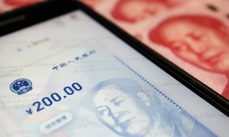 Ngân hàng Trung ương Trung Quốc bắt đầu nghiên cứu và phát triển đồng Nhân dân tệ số từ năm 2014 - Ảnh: Reuters