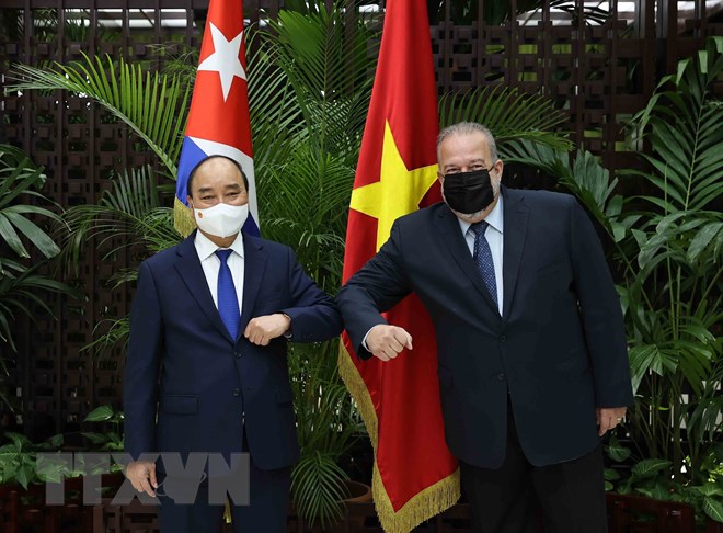 Chủ tịch nước Nguyễn Xuân Phúc và Thủ tướng Cuba Manuel Marrero Cruz - Ảnh: TTXVN