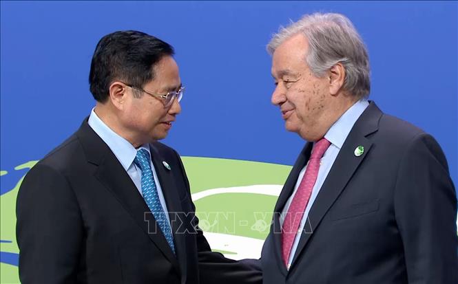 Tổng Thư k&yacute; Li&ecirc;n Hợp Quốc Antonio Guterres đ&oacute;n Thủ tướng Phạm Minh Ch&iacute;nh dự Hội nghị COP26 - Ảnh: TTXVN