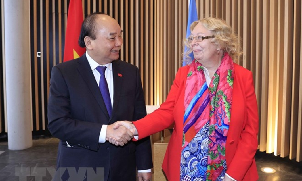 Chủ tịch nước Nguyễn Xuân Phúc và Tổng Giám đốc Văn phòng Liên hợp quốc tại Geneva Tatiana Valoya - Ảnh: TTXVN