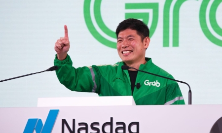Nhà đồng sáng lập Grab Anthony Tan trong lễ rung chuông chào mừng công ty lên sàn ngày 2/12 - Ảnh: Bloomberg.