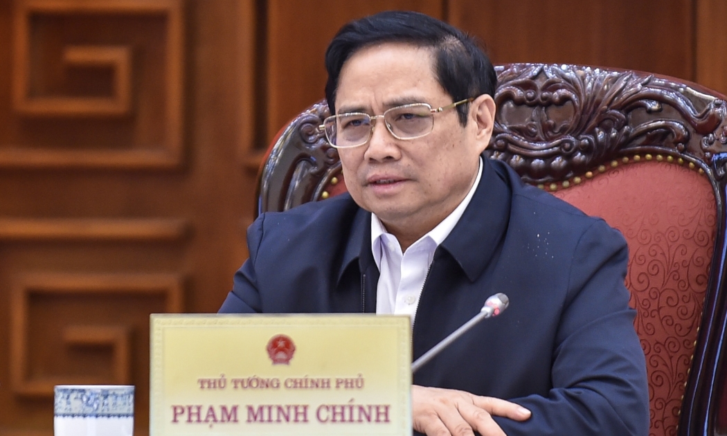 Thủ tướng Phạm Minh Chính  tại cuộc họp sáng 5/12 - Ảnh: VGP