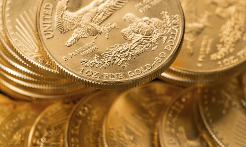 Giá vàng thế giới tăng, trong nước tụt dốc