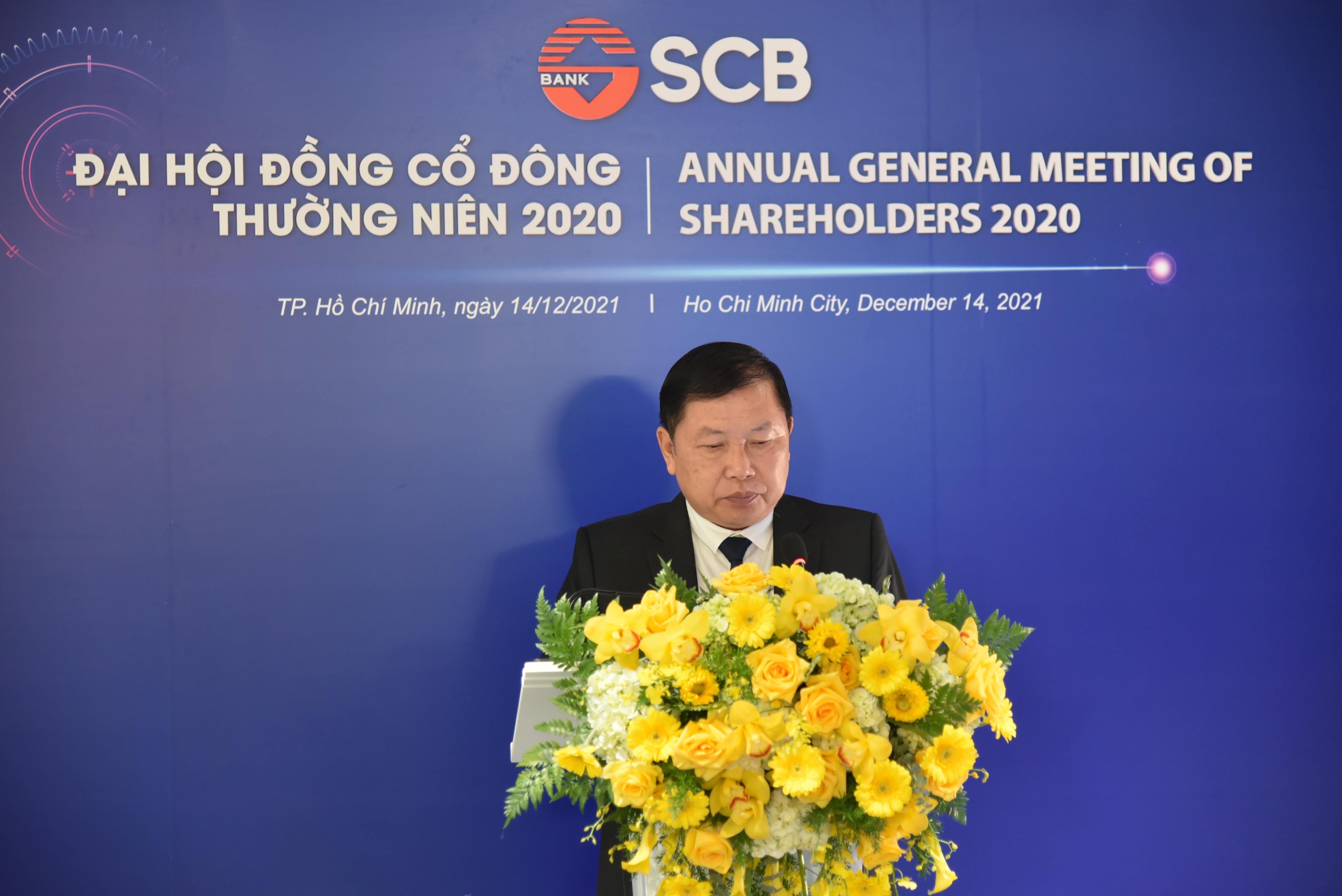 Ông Bùi Anh Dũng - Chủ tịch Hội đồng Quản trị SCB trình Đại hội Báo cáo của Hội đồng Quản trị năm 2020 và định hướng công tác quản trị năm 2021.