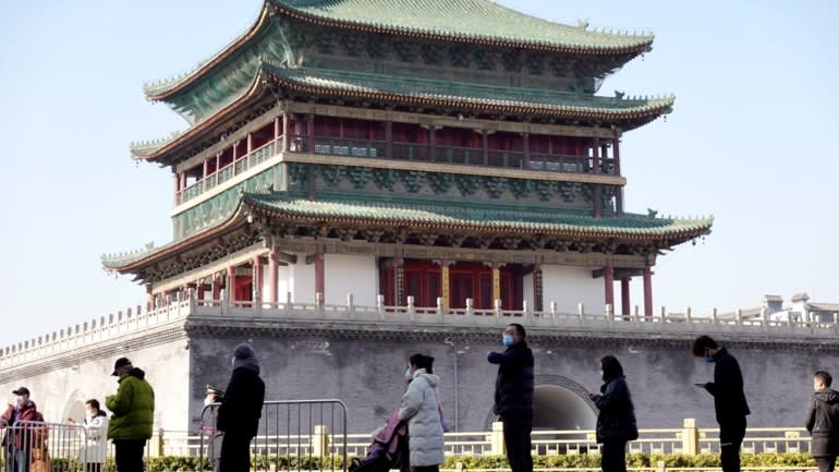 Doanh nghiệp Trung Quốc lao đao với các biện pháp hạn chế nghiêm ngặt để phòng dịch Covid-19 của chính quyền - Ảnh: Reuters