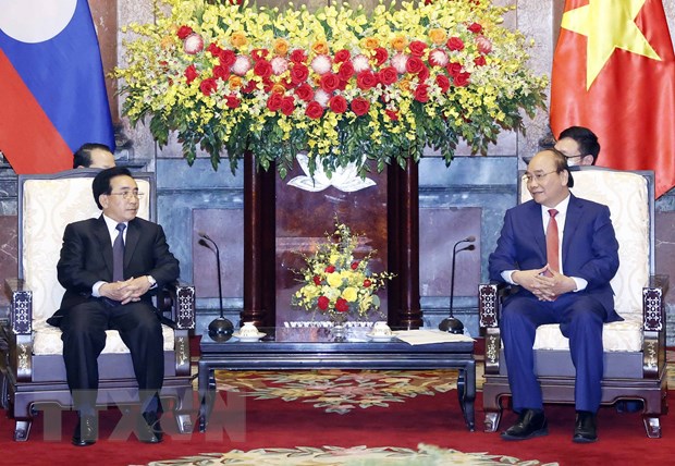 Chủ tịch nước Nguyễn Xuân phúc tiếp Thủ tướng Lào thăm chính thức Việt Nam - Ảnh: TTXVN
