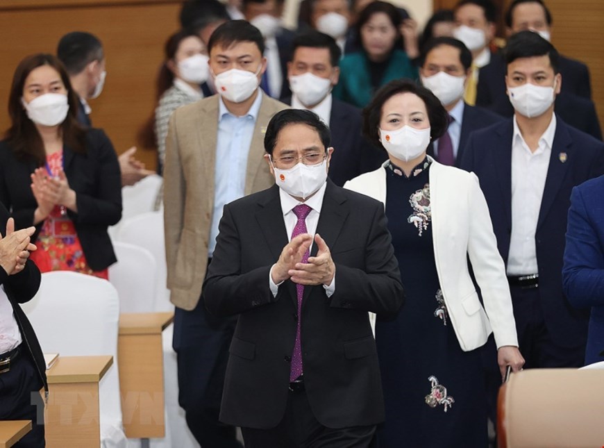 Thủ tướng Phạm Minh Chính dự hội nghị sáng 12/1 - Ảnh: TTXVN