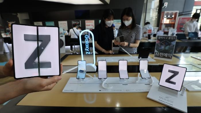 Bất chấp sự thiếu hụt chip, bộ phận kinh doanh chứng kiến ​​sự tăng trưởng nhờ doanh số các sản phẩm điện thoại thông minh cao cấp.