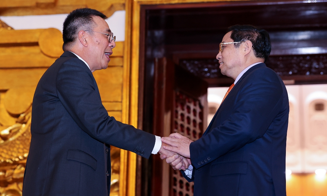 Thủ tướng Chính phủ Phạm Minh Chính tiếp ông Roongrote Rangsiyopash, Chủ tịch, Giám đốc điều hành Tập đoàn SCG (Thái Lan) - Ảnh: VGP