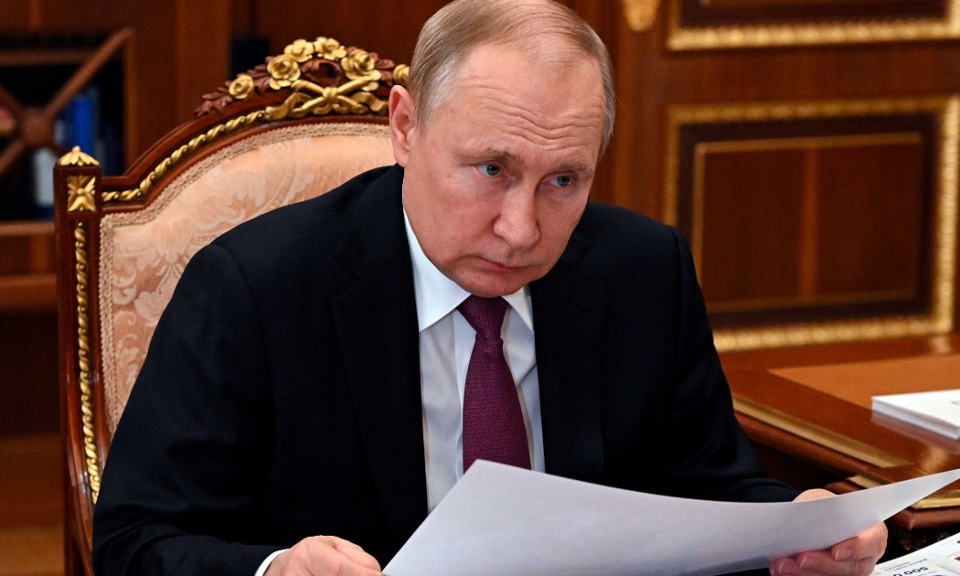 Tổng thống Nga Vladimir Putin tại một cuộc họp ở Mosow ngày 21/3 - Ảnh: Sputnik