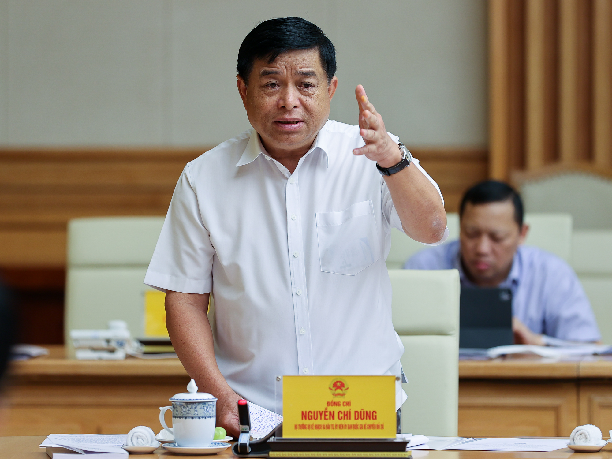 Bộ trưởng Bộ Kế hoạch v&agrave; Đầu tư Nguyễn Ch&iacute; Dũng ph&aacute;t biểu tại phi&ecirc;n họp - Ảnh: VGP.