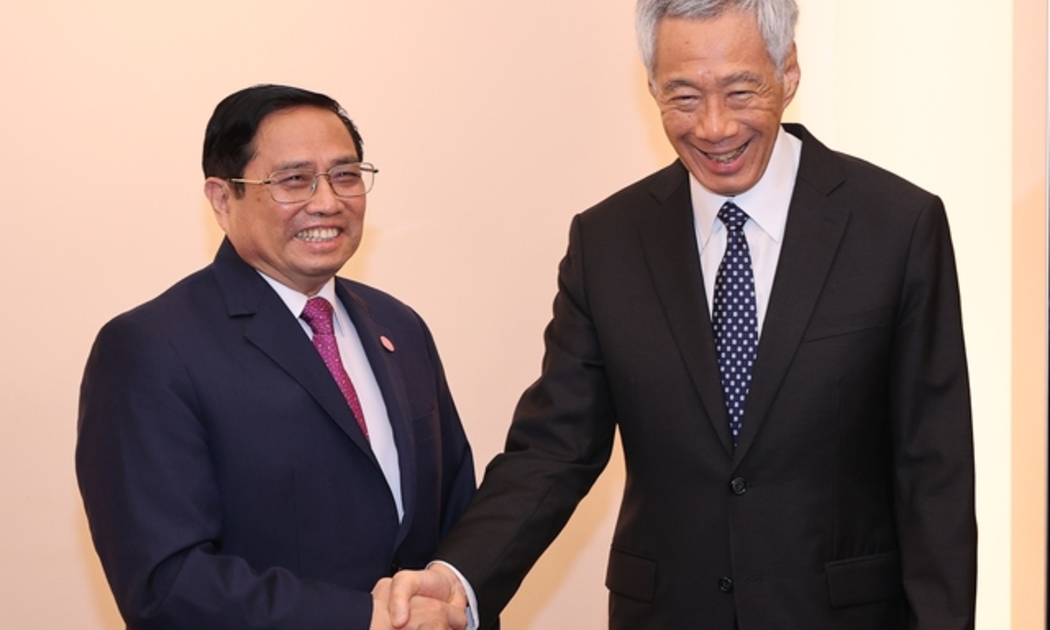 Thủ tướng Phạm Minh Chính và Thủ tướng Singapore Lý Hiển Long - Ảnh: VGP