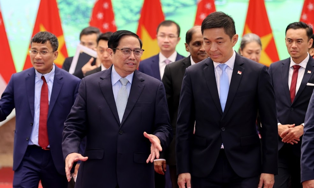 Thủ tướng Phạm Minh Chính và Chủ tịch Quốc hội Singapore Tan Chuan-Jin - Ảnh: VGP