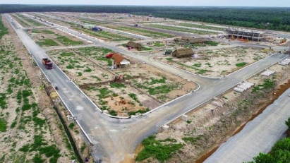 Interest in land plots down