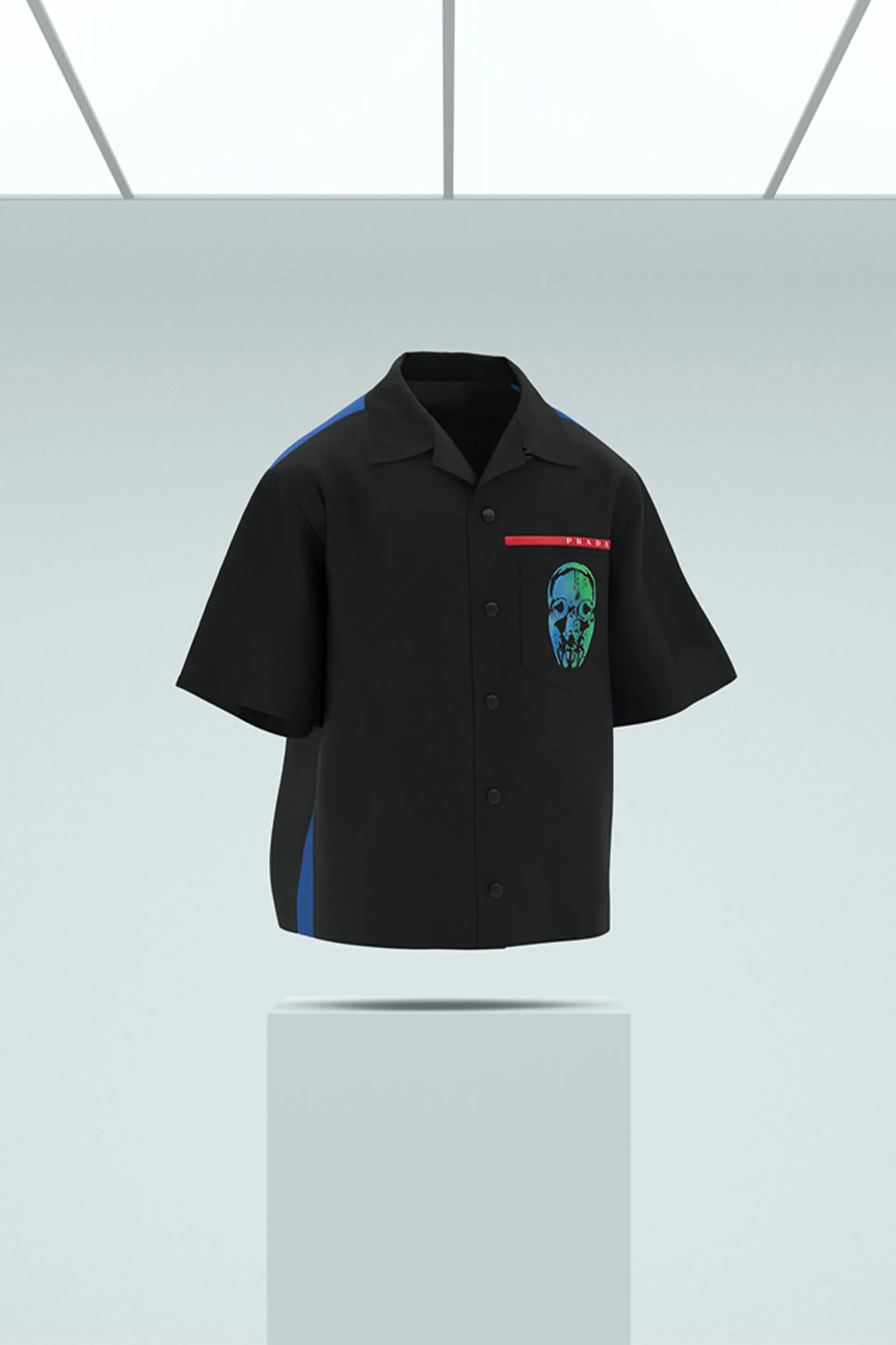 Người mua sẽ nhận được NFT miễn phí cũng như một chiếc áo sơ mi cài cúc unisex Prada x Cassius Hirst, có hai màu đen hoặc trắng.