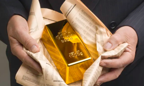 Giá vàng giảm mạnh vì USD tăng giá