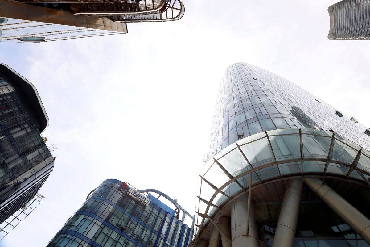 Trụ sở của tập đoàn Evergrande Group ở Thượng Hải - Ảnh: Reuters.