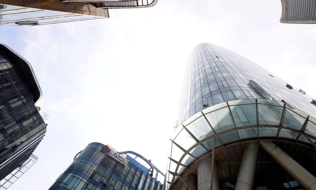 Trụ sở của tập đoàn Evergrande Group ở Thượng Hải - Ảnh: Reuters.
