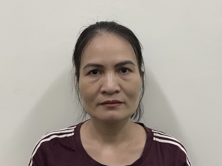 Bà Nga khi bị bắt. Ảnh Công an TP Hà Nội.