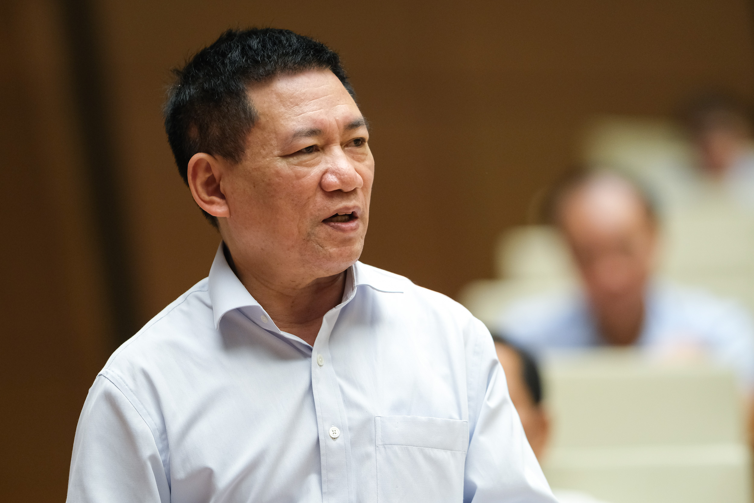 Bộ trưởng T&agrave;i ch&iacute;nh Hồ Đức Phớc trả lời tại phi&ecirc;n chất vấn s&aacute;ng 10/8