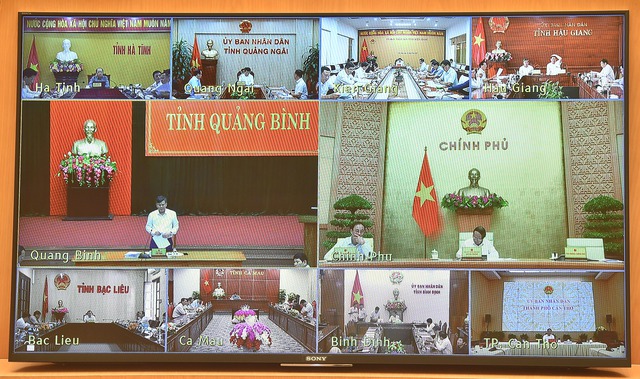 Đại diện 12 tỉnh, thành phố có dự án đi qua dự họp theo hình thức trực tuyến - Ảnh: VGP.